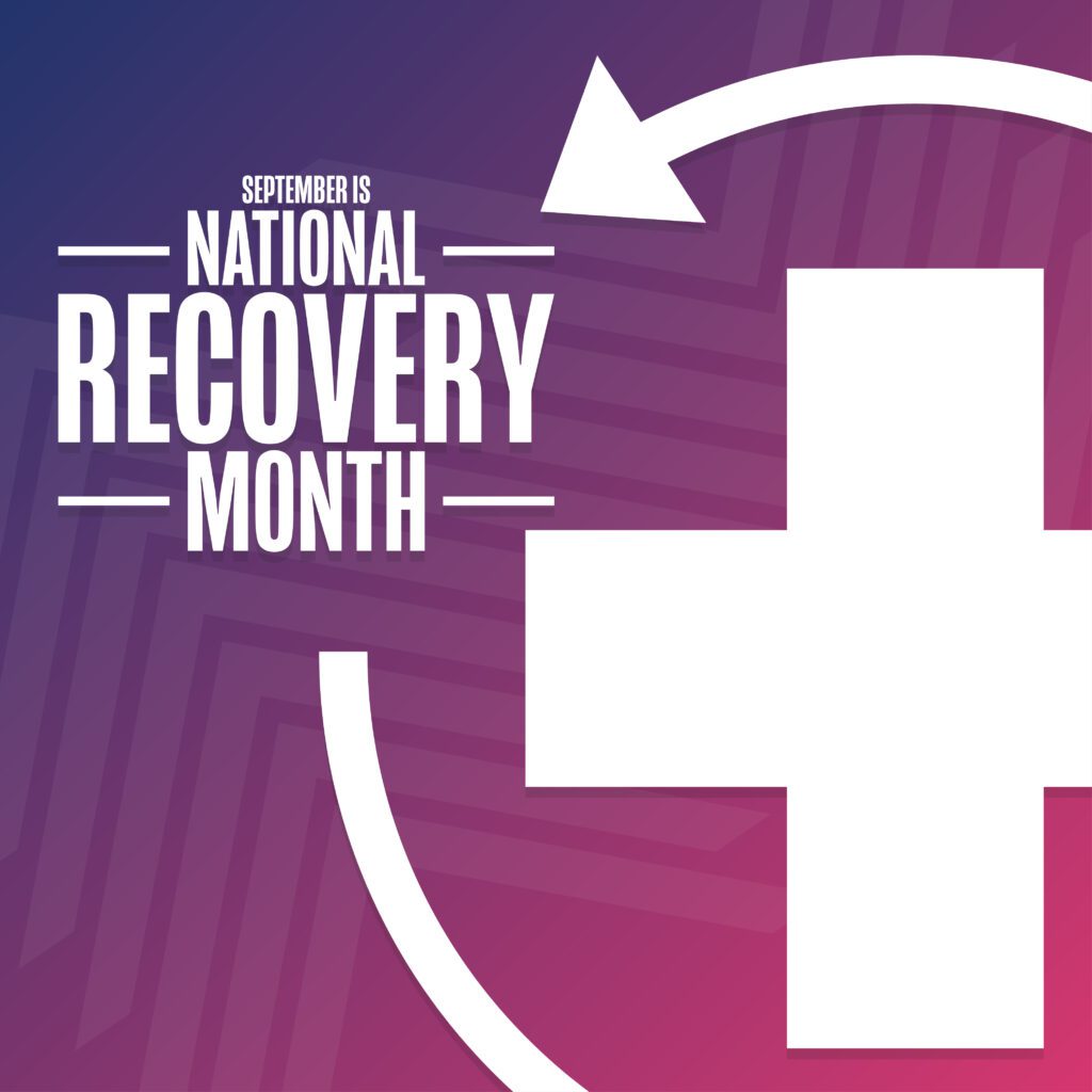 A white cross and the words september is national recovery month.